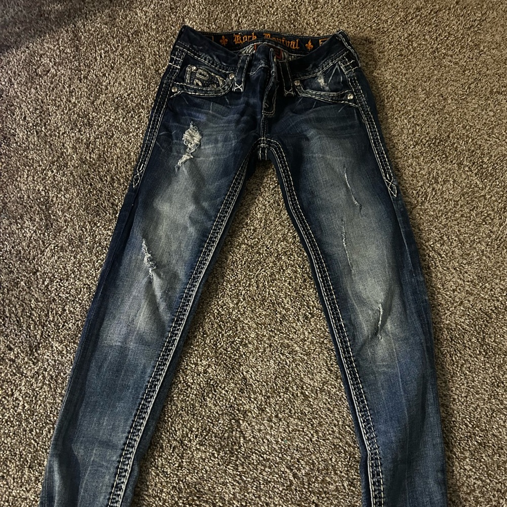 y2k low waisted skinny distressed rock revival jeans with fleur de lis/bedazzles